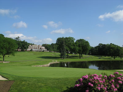 The signature hole at Baltusrol Lower with the amazing clubhouse in the background