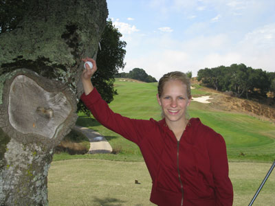 Stac poses next to the tree at TPC San Francisco Bay at Stonebrae