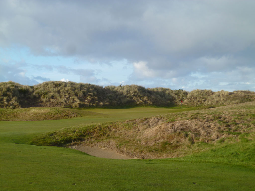 A great example of a green sitting below the dunes - 14th Hole at Bandon Dunes