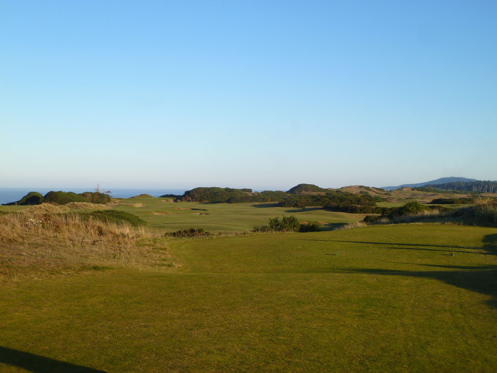 The half-par 3rd at Pacific Dunes measures just 499 yards from the tips; a very reachable hole